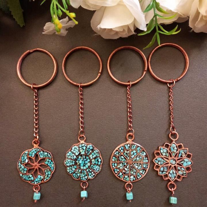 جاسوئیچی فیروزه کوبی رومس